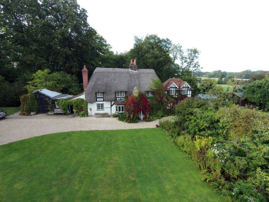 Aerial view of Farthing Corner cottage and grounds